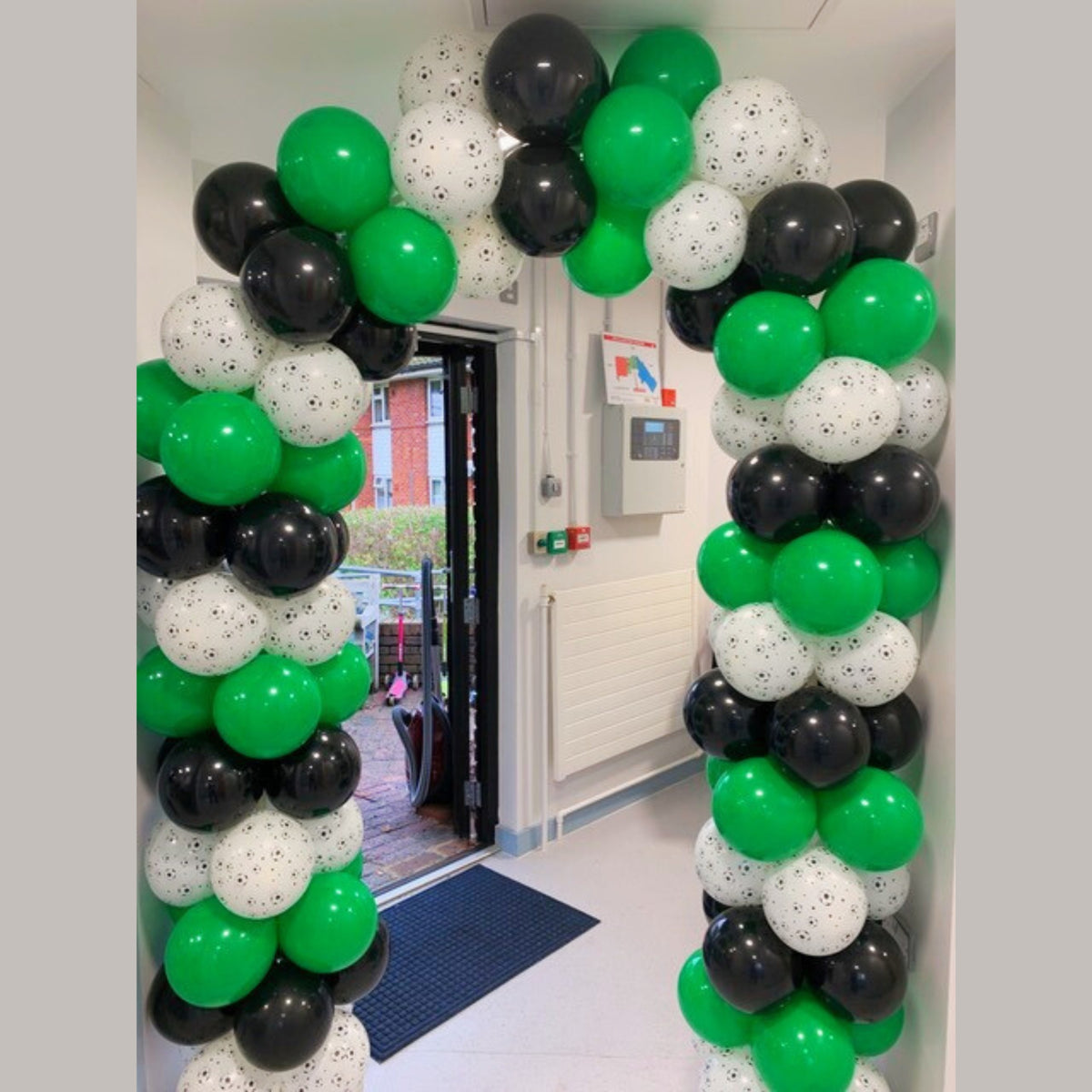 Doorway Balloon Arch in Green, Black & Football Print Latex