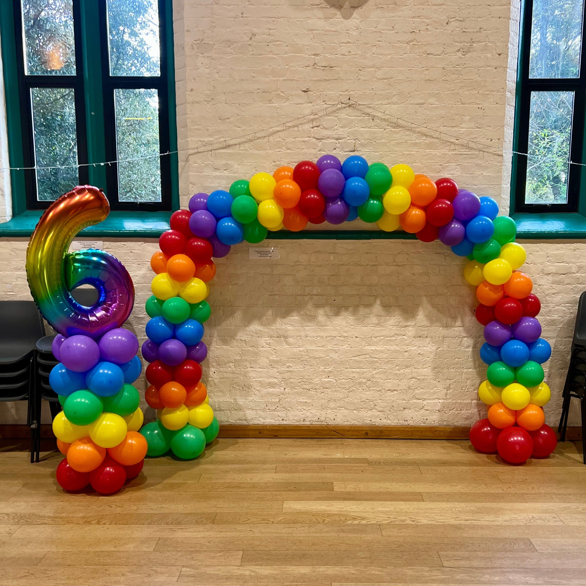 Rainbow Balloon Tower with Giant Rainbow '6' on top and Rainbow Mini-Arch