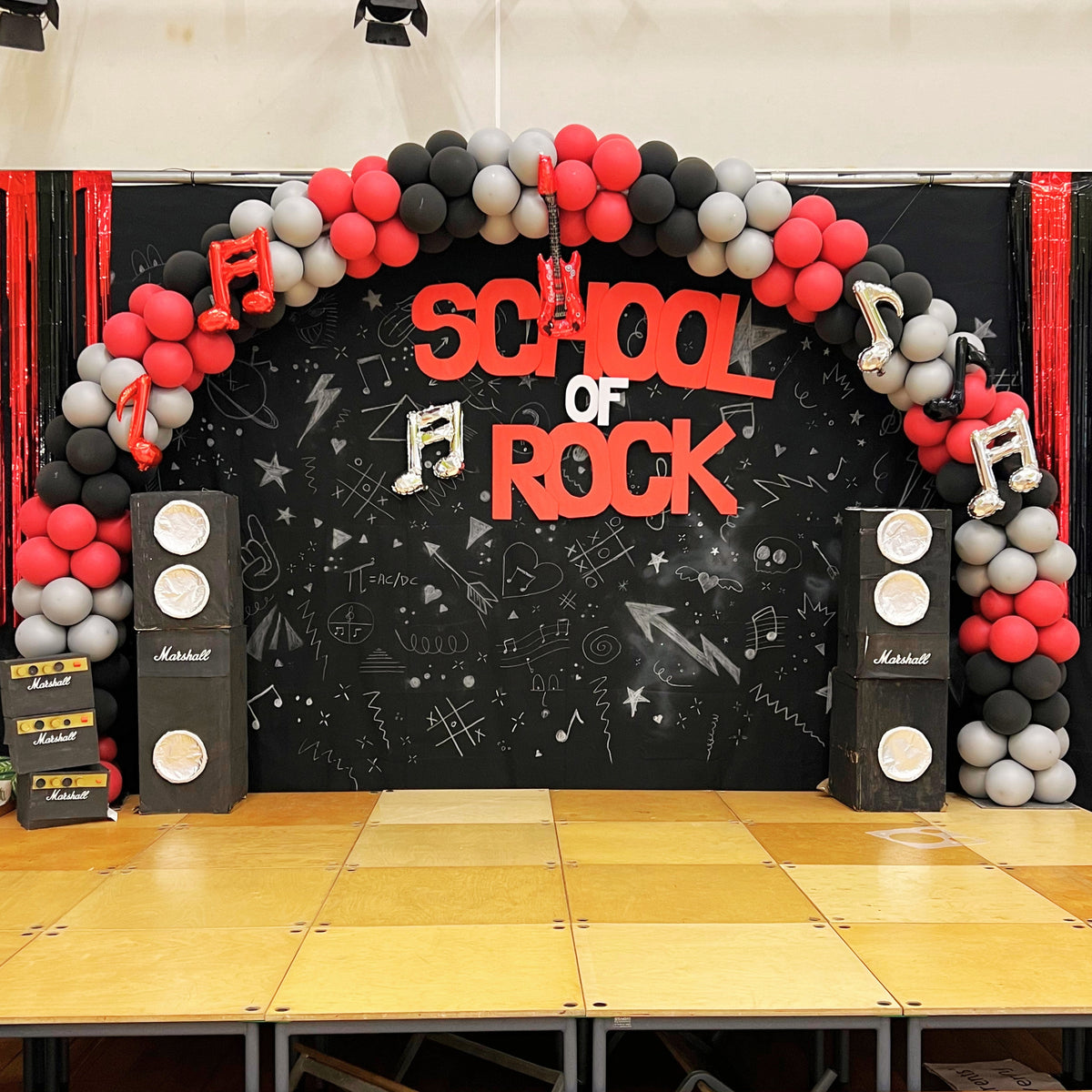 Red, Black & Silver Chrome with Air-Filled Music Shaped Balloons