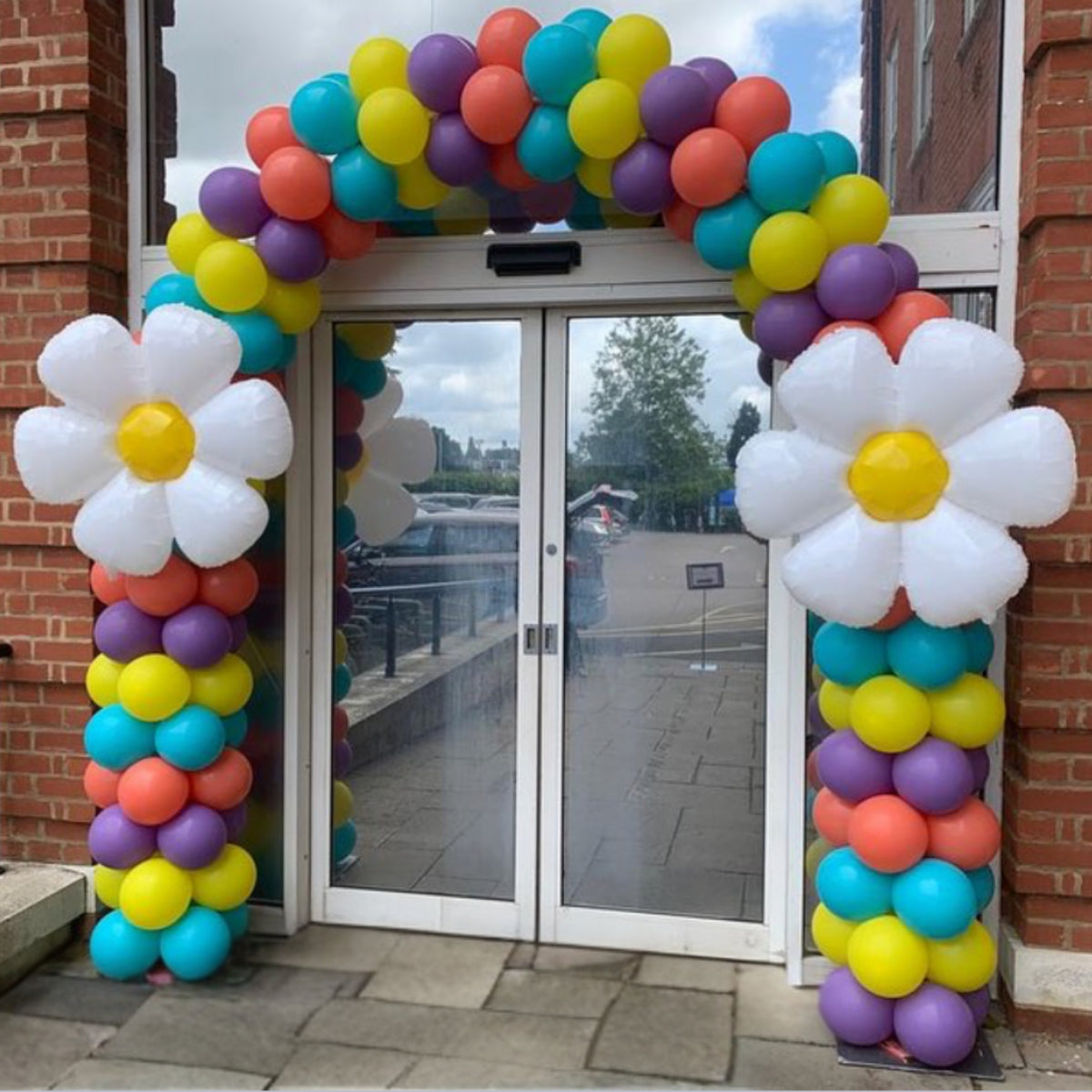 Blue, Yellow, Violet & Raspberry with Air-Filled Daisy Shaped Balloons