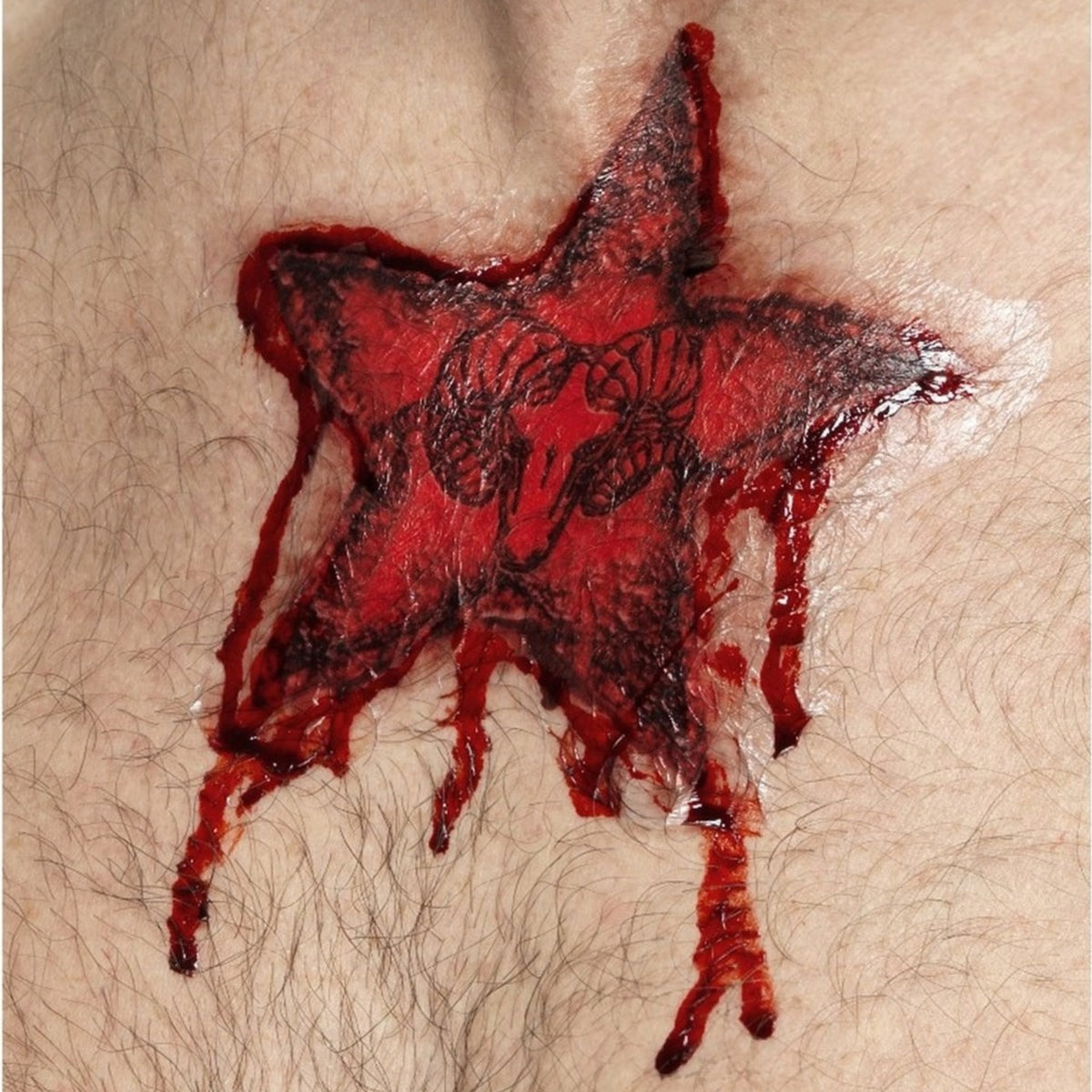 OCCULT RAMS HEAD RED STAR TATTOO